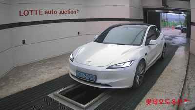 Tesla Model 3 2024 — صورة 1